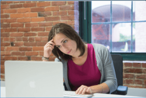 woman looking at a computer