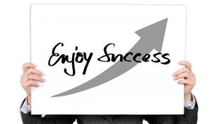 sign that says enjoy success
