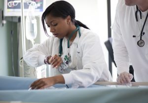 nurse taking pulse