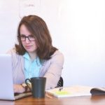 woman and laptop computer