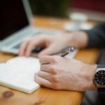 hand holding a pen