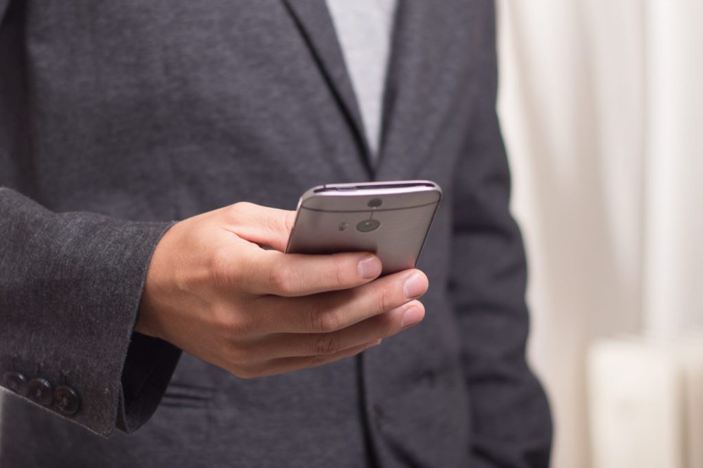 man holding phone