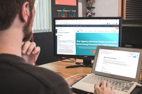 man looking at computer