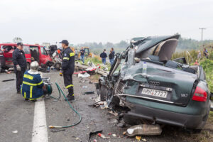 large truck crashed into a number of cars and 4 people were killed