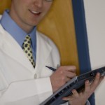 doctor holding a tablet using technology as the legal nurse consultant's friend