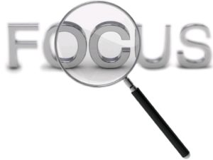 magnifying glass over the word focus