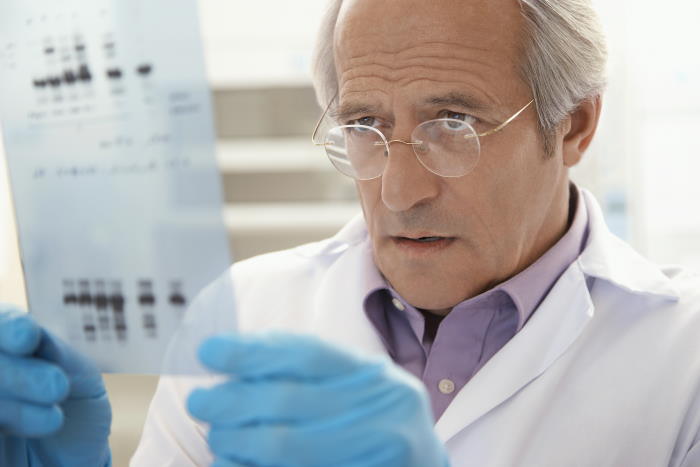scientist looking at DNA of sexual assault